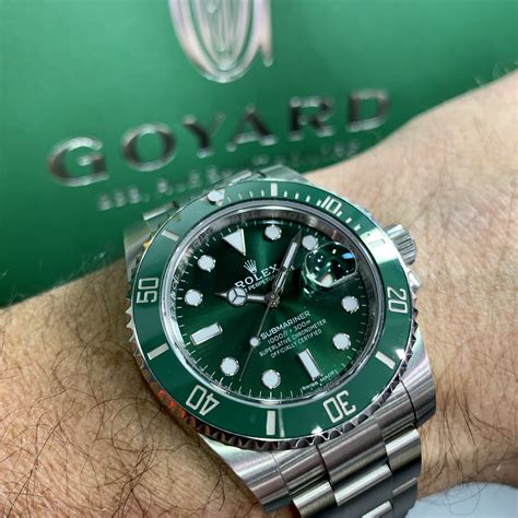 gold rolex submariner green dial